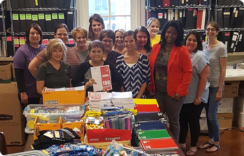 Baggett McCall Donates School Supplies to Flood Victims